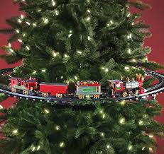 Thomas and friends train going around the christmas tree. Christmas Tree Train Petagadget Christmas Tree Train Christmas Train Harry Potter Christmas Decorations