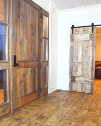 Sliding barn door separates the home office from the small bathroom [from: Doors Balsam Millwork
