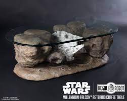 Millennium Falcon Asteroid Coffee Table Regal Robot Modustrial maker shows off how he built a sweet coffee table from concrete, wood, epoxy resin, and led strips.