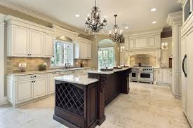 Elegant Kitchen With White Kitchen Cabinets And Espresso Island Quartz Countertops Tile Backsplash Travert Luxury Kitchens Luxury Kitchen Design Luxury Kitchen