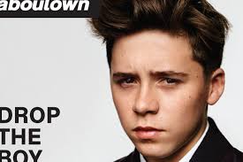 Brooklyn poses as a Man About Town