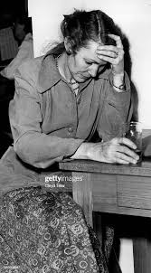 MAR 28 1953; Griefstricken Mrs. Donna Geyer stares unbelievingly... News  Photo