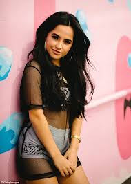 Usually when you wear tight clothes. Becky G Flashes The Flesh In Mesh Cover All And Skimpy Bikini Daily Mail Online