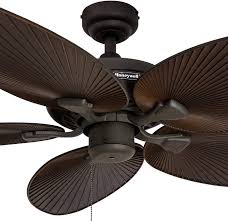 Choose from carved wooden leaf blades, palm, bamboo, and even nautical style fans with blades resembling sails from a sailboat. Honeywell Palm Island 52 Inch Tropical Ceiling Fan Five Palm Leaf Blades Indoor Outdoor Damp Rated
