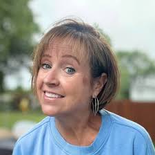 Woman cuts hair off at 57 years old