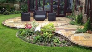 Below you will find a summary of the benefits, main options and some design ideas we handpicked for you along with beautiful photos. Patio Design And Natural Stone Walling Pete Sims Patio Garden Patio Garden Design Backyard Landscaping