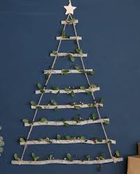 Watch the christmas trees grow! 15 Wooden Christmas Trees To Buy This Festive Season