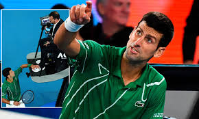 Novak djokovic rompe su raqueta durante su partido contra alexander zverev por los cuartos de novak djokovic azotó la raqueta de una manera tan violenta que un fragmento salió volando por los. Novak Djokovic Berates Umpire And Taps Him On The Foot After Violation During Australian Open Final Daily Mail Online