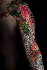 La flor de loto es otro de los grandes símbolos de asia gracias a una belleza que renace del mismo barro y su milenaria asociación con el budismo. Disenos Hermosos Del Tatuaje De Koi Fish Tatuajeclub Com