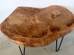 Find a stunning coffee table that combines bespoke style and practicality. Live Edge Oak Coffee Table Eatonwood