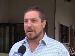 Australian far-right candidate quits after photo emerges of him saluting  swastika carved into his lawn