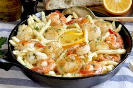 Serve and enjoy an amazing seafood pasta. Seafood Pasta With Shrimp And Scallops And Garlic Christina S Cucina