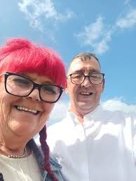 This is my photo from our family Christmas can someone please cut out edit  and add my father to this photo maybe into an angel above us in the corner,  he passed