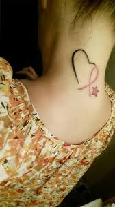 Whether one is a cancer survivor or just supporting someone they love, a tattoo in support of breast cancer awareness can be a gorgeous and strong way to wear the message. Pin On Ribbon Heart And Stars Tattoo