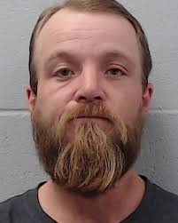 Hamby, Travis Alan was booked into the Hays County Jail