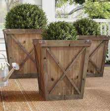 key design elements of a farmhouse exterior wood planters rustic planters outdoor planter boxes