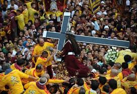 It's clad in a dark red robe with gold patterns. Black Nazarene Alchetron The Free Social Encyclopedia