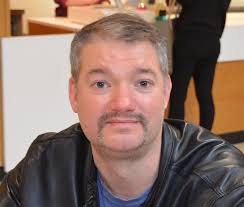 People shopping for sales, checking off Christmas lists