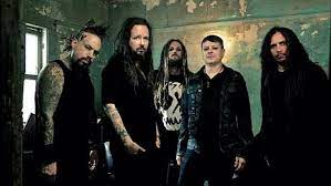 Korn members jam with Korn tribute band on stage—watch