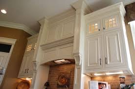 Gorgeous White Frame Beaded Kitchen Cabinets With Staggered Heights Built For A Model Ho Staggered Kitchen Cabinets Kitchen Cabinets Height Staggered Cabinets