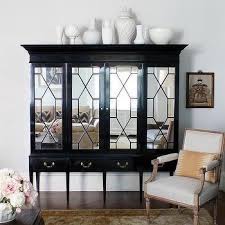 Plate rack adds vertical storage. Dining Room Mirrored Armoire Design Ideas