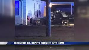 See the aftermath of deputy's crash into Augusta home