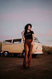 free people high waisted velvet bell bottoms 70s inspired senior portrait session in 2020 hippie senior pictures senior photo outfits vintage senior pictures hippie senior pictures senior