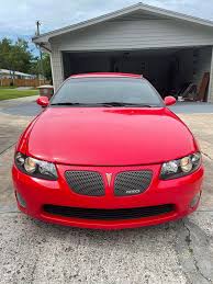 Image result for Medium Red 2004 Pontiac