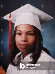 Image of Graduation photo of 17 year-old murder victim Corie Williams,  killed