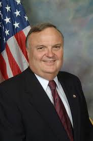 Challengers File Complaint Over Incumbents' Campaign Photos