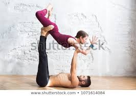 2 women practicing acro yoga. Man And Two Women Practicing Acro Yoga In Group Stock Photo C Uvgroup 7188348 Stockfresh
