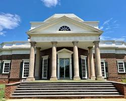Image of Visitors exploring interactive exhibits at Monticello's visitor center, learning about Jefferson's life and legacy