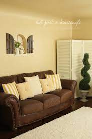 In a world dominated by bright, airy rooms, brown furniture has become synonymous with dated. Cheerful Yellow Family Room The Big Reveal Stacy Risenmay