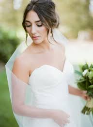 Small sparkly barrettes peek out from the curls and look beautiful. 20 Wedding Hairstyles With Veils For Every Kind Of Bride Weddingwire