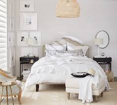 In this firehouse hotel room designed by etc.etera, an angular dark green pendant pops against the marigold tones and. Flora Rattan Pendant Pottery Barn