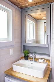 Tiny House That Expands To 374 Sq Ft Using Slide Outs Tiny House Bathroom Modern Tiny House Tiny House Plans