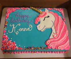 Instead of a white outside and color for the ears, horn, and eyelashes, go for the opposite effect with a watercolor cake and keep the extra features white. Unicorn Cake Ideas Sheet Cake