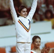 Nadia elena comăneci ist eine ehemalige rumänische kunstturnerin, die 1976 in montreal mit nur 14 jahren dreimalige olympiasiegerin wurde . 50 Geburtstag 10 0 Nadia Comaneci Die Traumfrau Des Turnens Welt