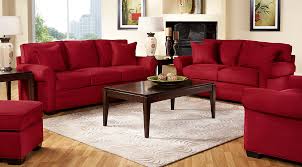 A sophisticated, neutral living room in chicago's historic palmolive building features a clever mix of antiques and vintage finds, which create a sense of balance. Red White Beige Living Room Furniture Decorating Ideas