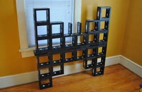 Ten Amazing Things To Make And Do With Old Vhs Tapes Vhs Tapes Dvd Shelves Recycled Cds