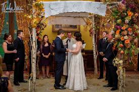The ceremony took place in front of a wall of roses on the castle's property, and. Wedding Spotlight Holly Joe Aisle Files Blog