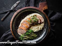 Keto Pork Tenderloin With Macadamia Cauliflower Mash Recipe Pork Pork Tenderloin Creamy Mashed Cauliflower