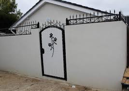 The same word is used to refer to a thin slat built inside a door frame to prevent a door from swinging through when closed. Regi S Forge Bespoke Decorative Wrought Iron Wall Topper Facebook