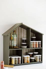 Create Your Own Spice Rack Using An Ikea Dollhouse Hunker Diy Spice Rack Ikea Dollhouse Diy Spices