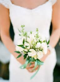 This hairstyle looks best with a lot of small flowers (try baby breath), or one big vibrant flower. This Bride S Mother Arranged All Of The Florals For Her Wedding Which Made This Small B Small Wedding Bouquets Small Bridesmaid Bouquets Small Bridal Bouquets