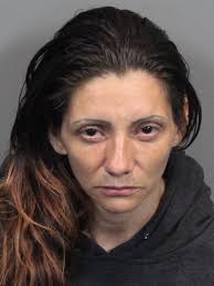 Reno police: Woman tries slashing at local resident with box cutter