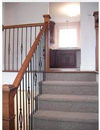 We've been leaning toward taking out the spindled railing and putting in a half wall that could have cubbies with baskets on the entryway side and bookshelves on the living room side, but the concern was losing lighting in the. Split Level Home Upper Stairs Split Level House Level Homes Updating House
