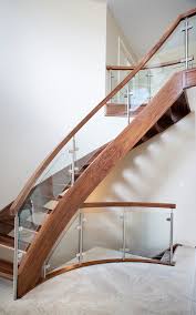Scroll top railings with butterfly accents. Curved Glass Railing Houzz