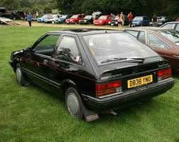 Image result for Nightfire Red 1994 Reliant