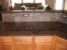 This assortment of dim rock countertops presents a perfect mix of dark and brown colored shaded foundation including tan and light dim bits. Granite Tan Brown Granite W Slate Tiles Granite Countertops Brown Granite Countertops Brown Tile Backsplash